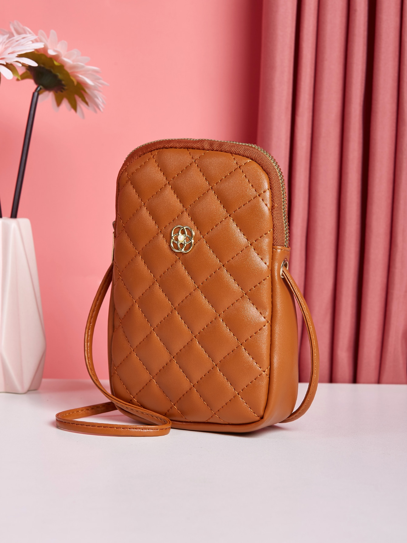 Minimalist quilted metal crossbody bag