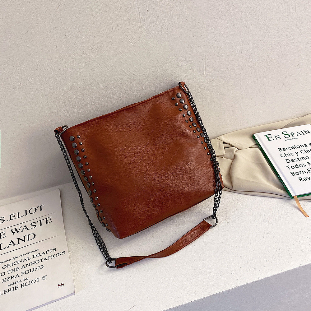 Winter new female bag retro style large capacity one-shoulder bucket bag soft leather rivet messenger bag