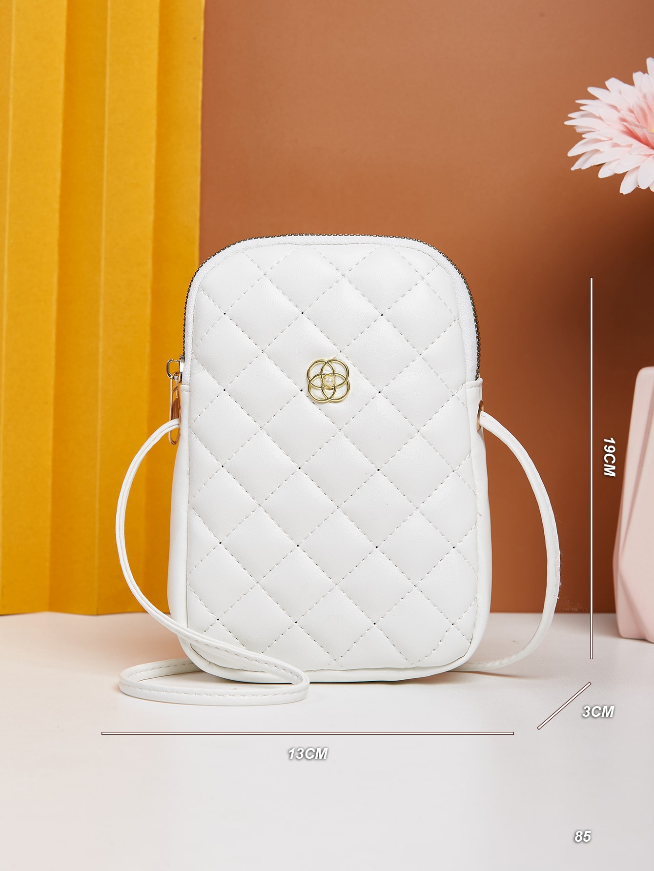 Minimalist quilted metal crossbody bag